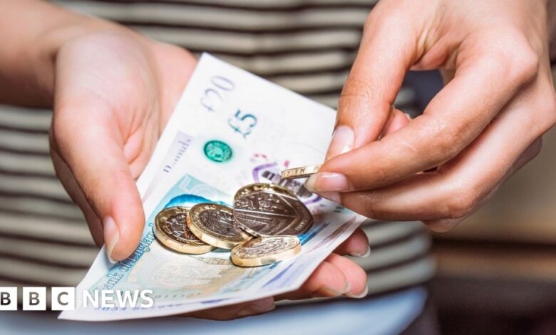 110135740 moneyhand getty.jpg