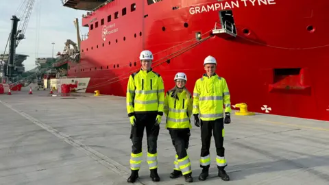 Dogger Bank Wind Farm Dogger Bank apprentices next to one of the supply vessels for the windfarm