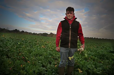 Cameron Lawrence A young farmer in his field