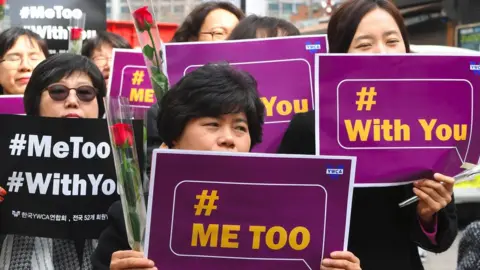 AFP South Korean demonstrators hold banners during a rally to mark International Women"s Day as part of the country"s #MeToo movement in Seoul on March 8, 2018