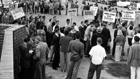 BRIDGEMAN IMAGES Walt Disney Studios: Members of the AFL Screen Cartoonists' Guild at a picket line, demanding recognition as the collective bargaining agency and reinstatement of leaders discharged for union activity, Burbank, CA, 28 May 1941