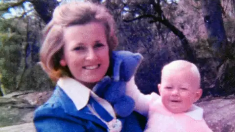 SUPPLIED Lynette Dawson holds one of her baby daughters