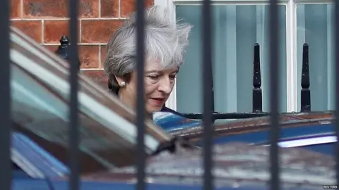 Reuters Theresa May leaving Downing Street