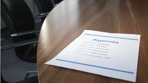 Getty Images Table with agenda print out