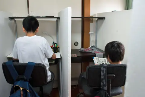 Stephane Bureau du Colombier Two students in Tamagawa Free School