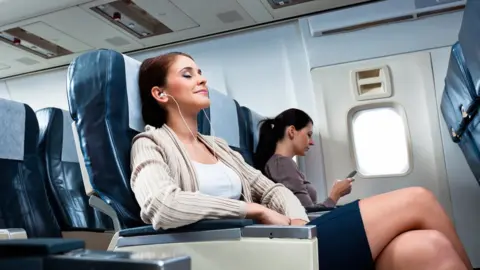Getty Images Women on plane seats