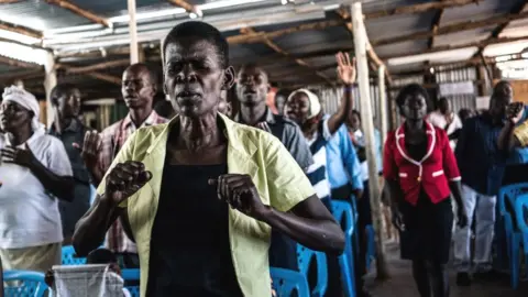 AFP Worshippers at a service at the Voice of the Potter's Messenger (VPN) Church in Kisumu, Kenya - August 2017