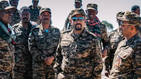 Fana Broadcasting Corporate Abiy Ahmed pictured on the front line in sunglasses