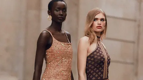Karen Millen Women modelling Karen Millen clothing