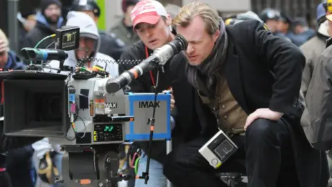 Getty Images Christopher Nolan on the Warner Bros. set of Dark Knight Rises in 2012