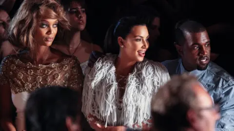 Getty Images Tyra Banks, Kim Kardashian and Kanye West