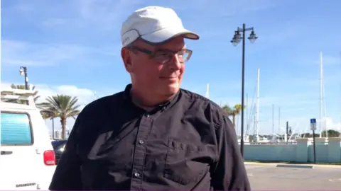 Wes Blackman, standing outside