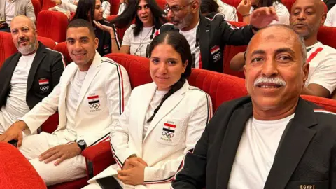 Egyptian Cycling Federation Shahd Saeed (2nd right) with other members of Egypt's Olympic cycling team (9 July 2024)
