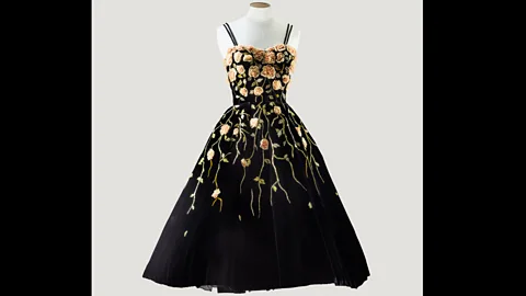 Sotheby’s/Art digital studio This Balmain velvet cocktail dress is embroidered with chiffon roses by Lesage. (Credit: Sotheby’s/Art digital studio)