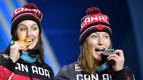Getty Images Canada's gold medal-winner Kelsey Serwa and silver winner Brittany Phelan on the podium for Women's Ski Cross at Pyeongchang 2018 Winter Olympic Games (Credit: Getty Images)