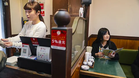 Shiho Fukada and Keith Bedford "I thought I was doing something wrong," by doing things solo in group-oriented Japan, says Tokyo-based writer Mayumi Asai (Credit: Shiho Fukada and Keith Bedford)