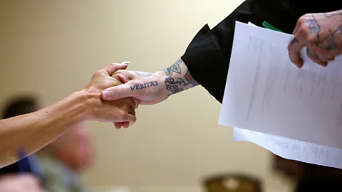 Getty Images The right handshake during a job interview can make a difference – facing your palm up is one way of not showing dominance (Credit: Getty Images)