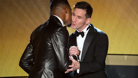 Getty Images Argentinian footballer Lionel Messi demonstrates just how familiar the handshaking style in his home country can be (Credit: Getty Images)