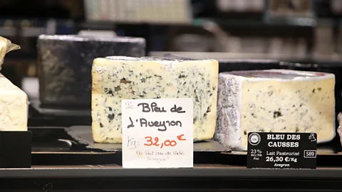 Emily Monaco Blue cheeses are of the many cheeses for sale at Quatrehomme fromagerie (Credit: Emily Monaco)