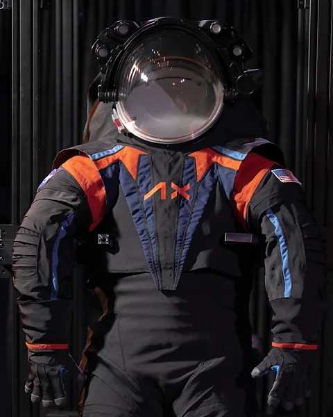 Axiom Space The new suit was unveiled to the public, with black coverings to conceal some of the more secret parts of its design (Credit: Axiom Space)