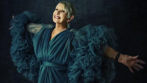 Adrienne Guinn Joy Fox in blue dress portrait