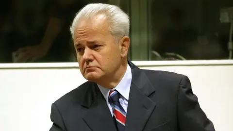 Getty Images Former Yugoslav President Slobodan Milosevic arrives to open his defence at the war crimes tribunal 31 August 2004 in The Hague, Netherlands
