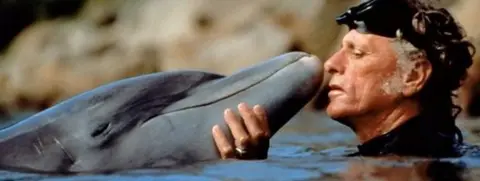 David Higgs Dolphin trainer Ric O'Barry with Flipper