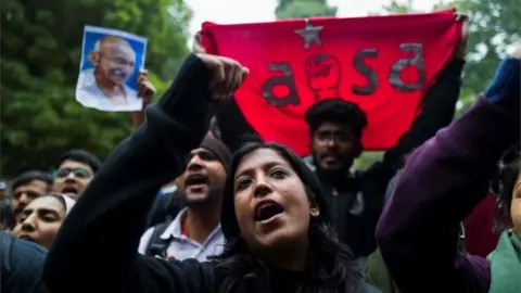 AFP Demonstrators shout slogans to protest against the Indian government's Citizenship Amendment Bill (CAB) in New Delhi on December 16, 2019.