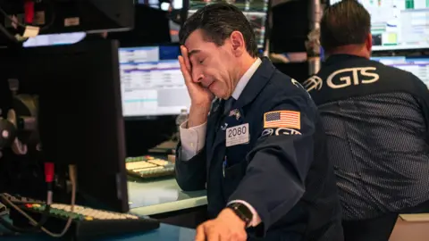 Getty Images Traders work on the floor of the New york Stock Exchange on February 28, 2020 in New York City.