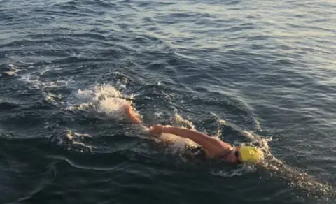 PA Media Chloe McCardel pictured on an earlier endurance swim