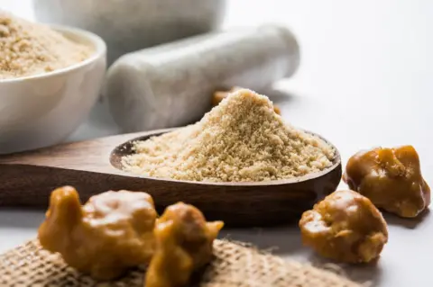 Getty Images Asafoetida cake and powder or Hing.