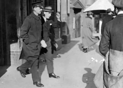 Getty Images Frederick Bywaters at Ilford police station in Essex after his arrest for the murder of Percy Thompson