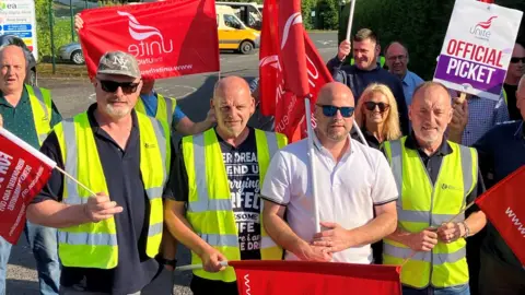 BBC Striking Unite members at the Education Authority transport depot in Enniskillen