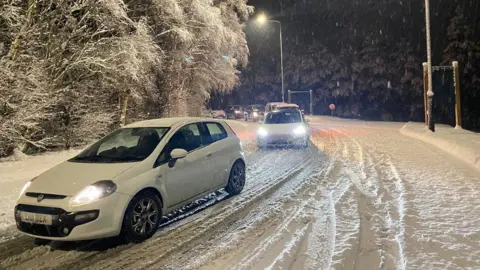 Anna MacMahon Vehicles at a standstill in the snow on the M6 in Cumbria on Saturday
