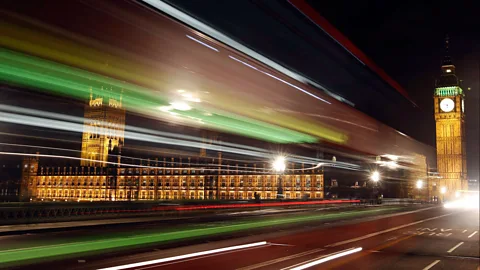 Light trails made by a passing bus illuminate the night sky in front of Britain's Houses of Parliament in London. (Stefan Wermuth/Reuters)
