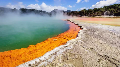 MLenny/Getty Images New Zealand’s location in a geologically active region means travellers can visit hot springs, geysers and sulphuric pools (Credit: MLenny/Getty Images)