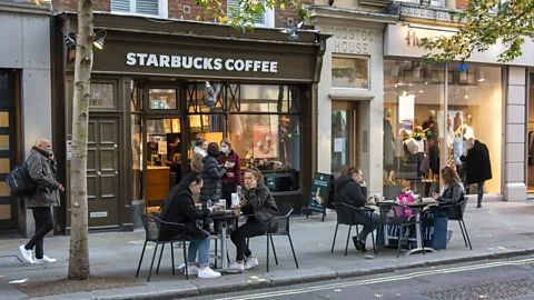 SOPA Images/Getty Images Today, it seems like every city centre in Britain is filled with international coffee chains (Credit: SOPA Images/Getty Images)