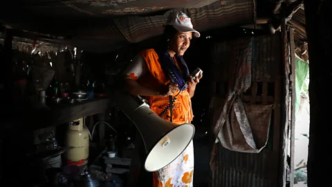 Catherine Davison "I joined the CPP to make sure that no other children have to lose their lives," says Chaina Mistry, pictured here preparing for an early warning drill (Credit: Catherine Davison)