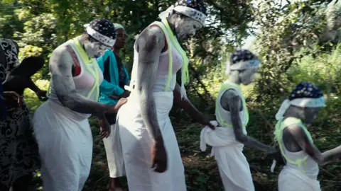 BBC Women taking part in a religious ritual