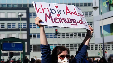 EPA It's thought that people are more susceptable to conspiracy theories during a crisis (Credit: EPA)