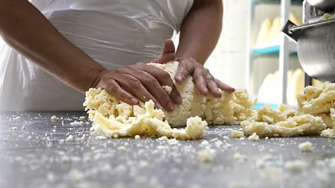 Linni Kral The curd is kneaded with salt between pressings in the rabilar (Credit: Linni Kral)