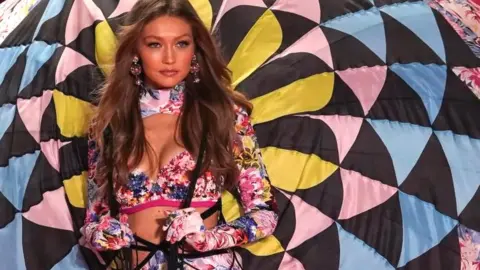 AFP US model Gigi Hadid walks the runway at the 2018 Victoria"s Secret Fashion Show on November 8, 2018 at Pier 94 in New York City