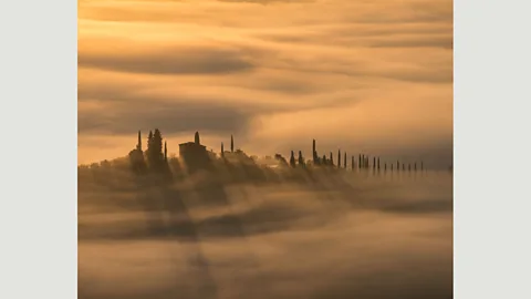Phil Malpas “The view is looking across the Val d’Orcia from just below Castiglione d’Orcia in Tuscany. There is often low-lying mist as the sun rises” – Phil Malpas (Credit: Phil Malpas)