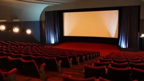 Andrew Poole An interior view of the Pavilion Cinema with plush red seats and a cinema screen